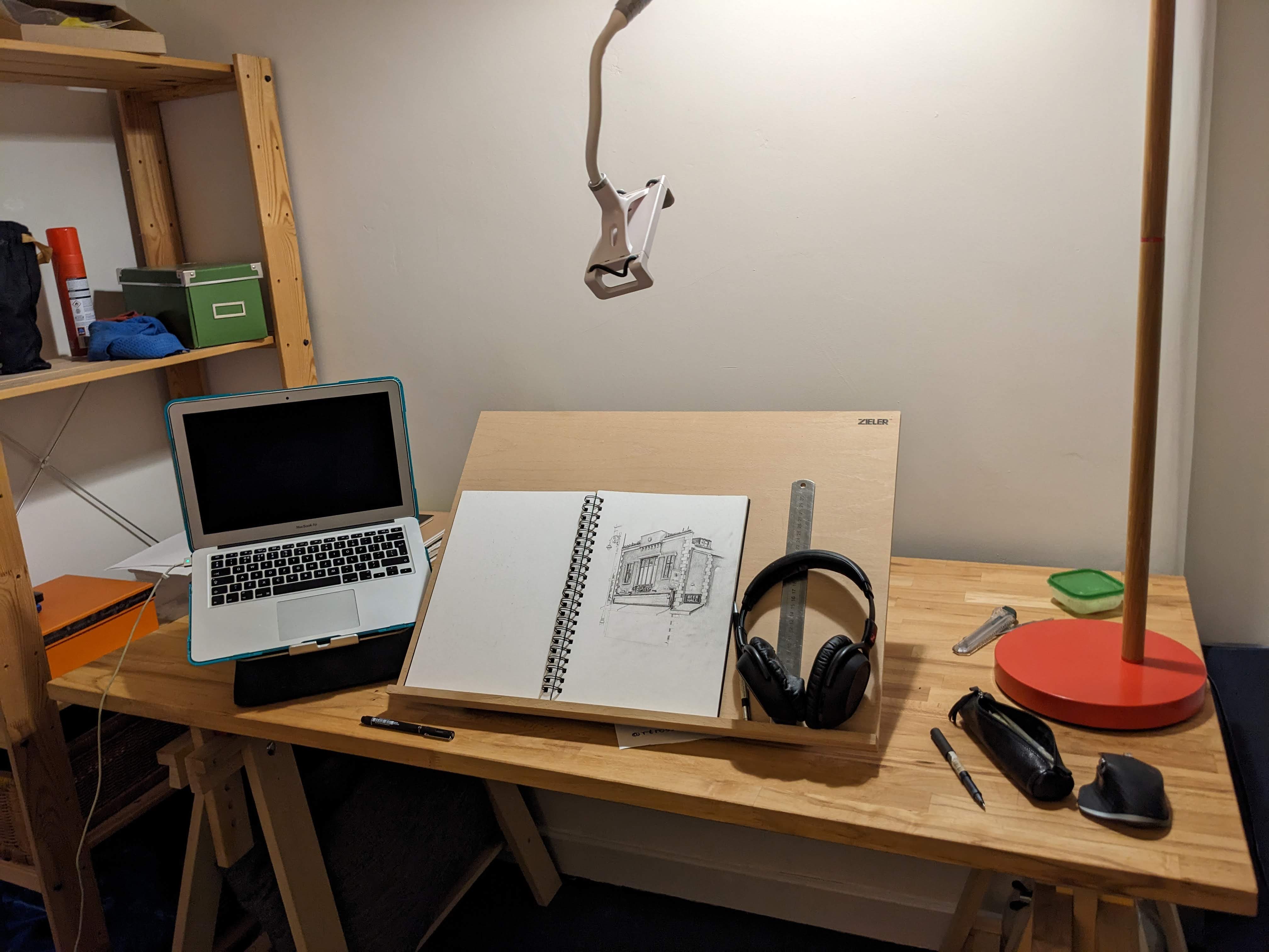 Studio setup — wide shot with reference photos